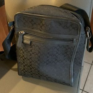 Coach black on black travel bag. Vintage style with canvas crossbody strap.